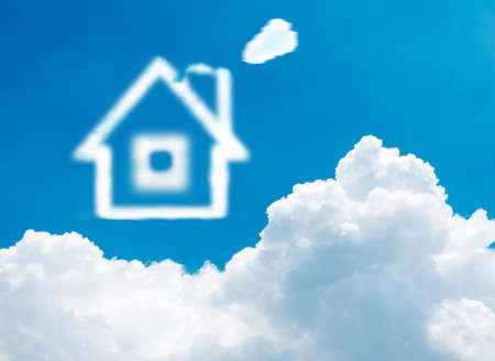 House of clouds in the blue sky on gradient-white backgroundの写真素材