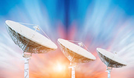 satellite dish antennas under skyの写真素材
