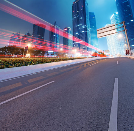 Asphalt road and modern city