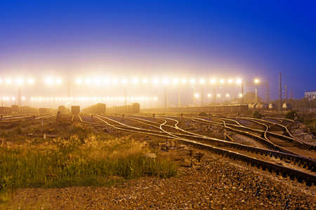 Cargo train platform at sunset with containerの写真素材