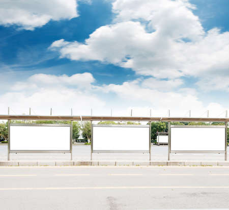 Bus stop with billboardの写真素材