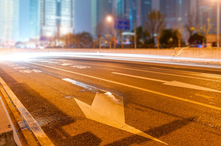 the light trails on the modern building background in shanghai china.