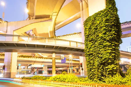 moving car with blur light through city at nightの写真素材