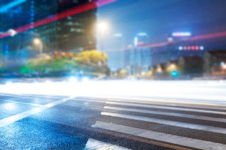the light trails on the modern building background in shanghai china.の写真素材