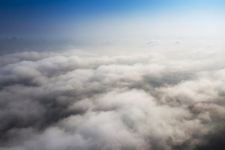 Big Blue sky and Cloud Top view from airplane window,Nature background