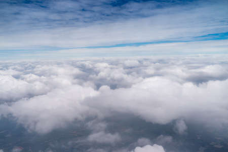 Big Blue sky and Cloud Top view from airplane window,Nature backgroundの写真素材