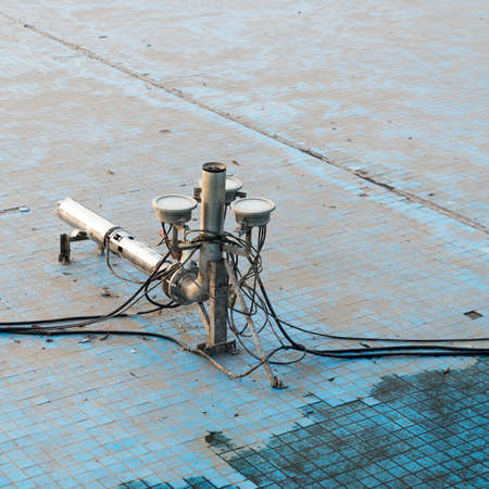 pipe system and lights in an empty fountainの写真素材