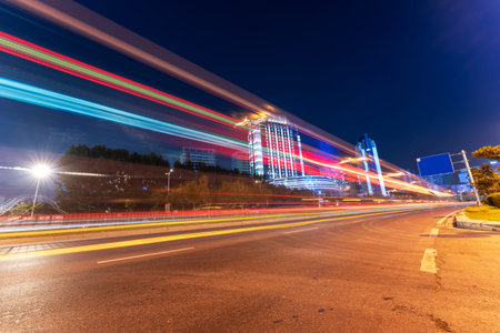 the light trails on the modern building background in shanghai china.