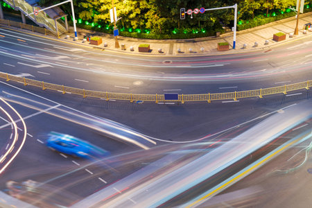 moving car with blur light through city at night
