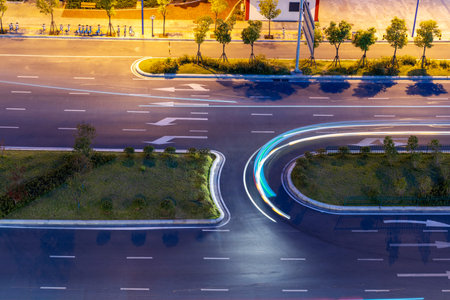 moving car with blur light through city at nightの写真素材