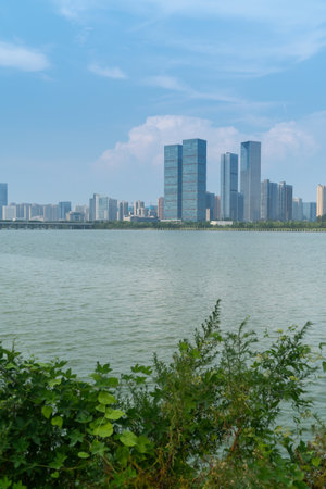 Lakeside modern office building in Chinaの写真素材
