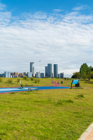 spring park and modern cityの写真素材