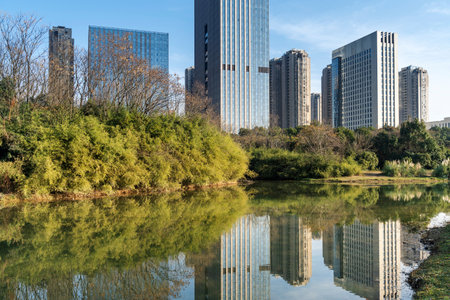 Lakeside modern office building in Chinaの写真素材