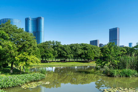 Lakeside modern office building in Chinaの写真素材
