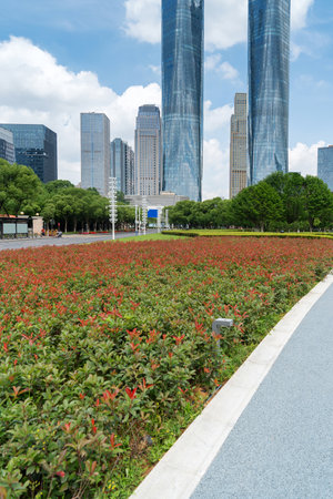 city park with modern building background in shanghaiの写真素材