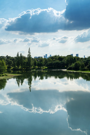 Lakeside modern office building in Chinaの写真素材