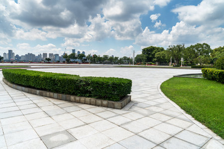 empty, modern square and skyscrapers in modern cityの写真素材