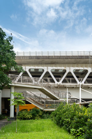 Looking up at a Large Interstate Highway Overpass and Blue Skyの写真素材