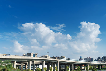 Highway overpass modern city skyline background