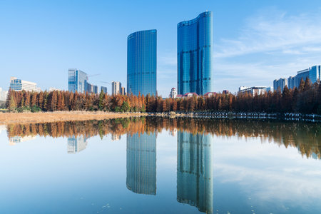 Lakeside modern office building in Chinaの写真素材