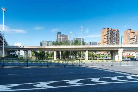 Highway overpass modern city skyline backgroundの写真素材