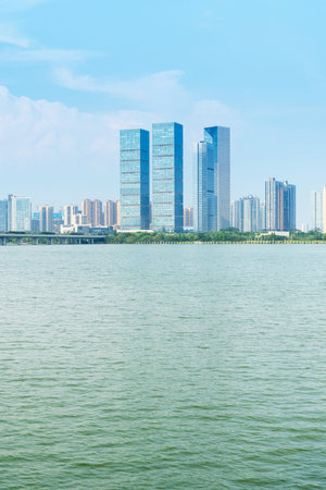 Lakeside modern office building in Chinaの写真素材