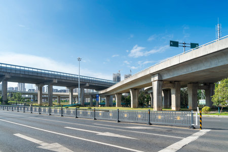Concrete structure and asphalt road space under the overpass in the city