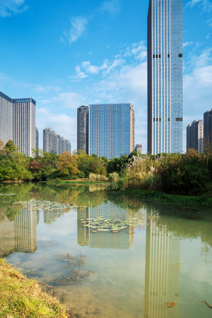 Lakeside modern office building in Chinaの写真素材