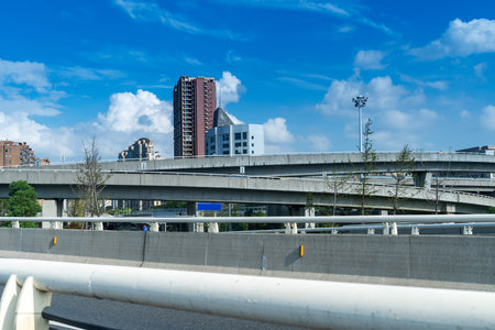 Highway overpass modern city skyline backgroundの写真素材