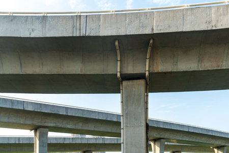 Elevated expressway during a sunny day. highway overpass against blue sky