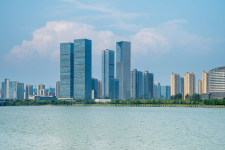 Lakeside modern office building in Chinaの写真素材