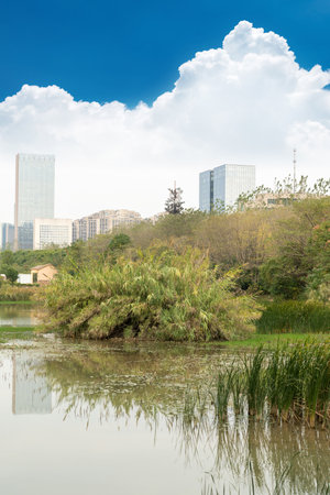 Lakeside modern office building in Chinaの写真素材