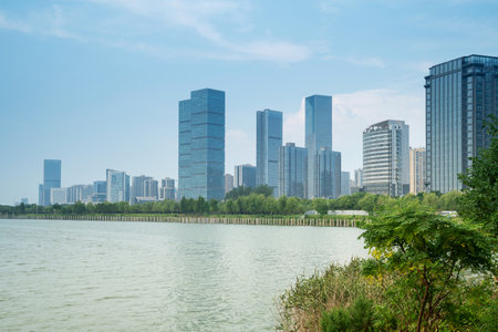 Lakeside modern office building in Chinaの写真素材