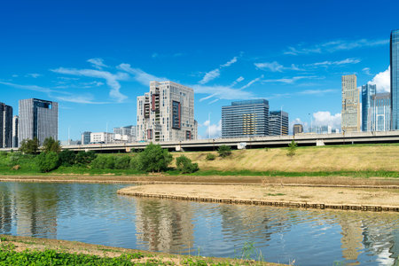 Lakeside modern office building in Chinaの写真素材