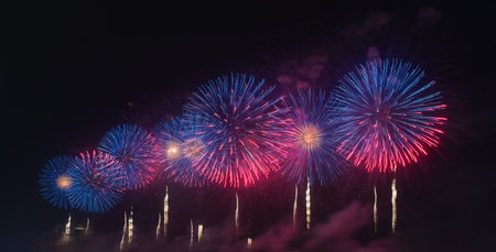 Colorful fireworks exploding at english bay against skyの写真素材