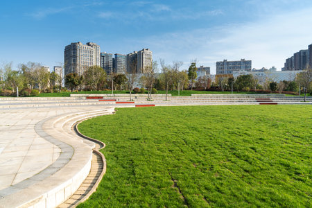 spring park and modern cityの写真素材