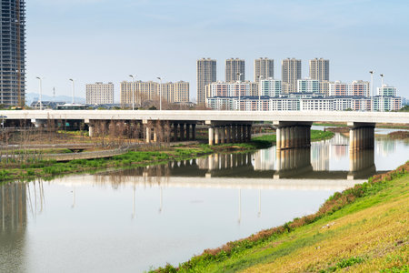 Lakeside modern office building in Chinaの写真素材