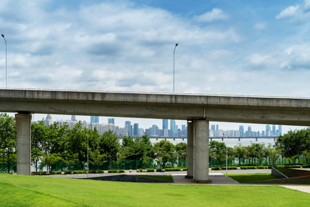 Looking up at a Large Interstate Highway Overpass and Blue Sky