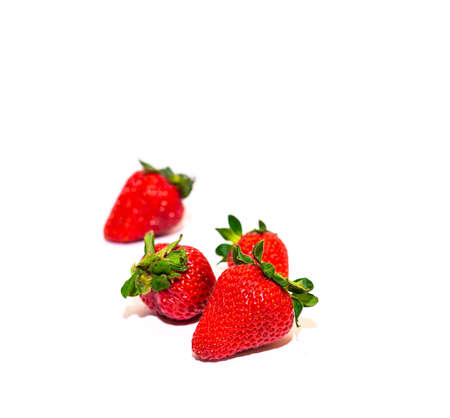 Delicious red strawberries from organic garden on white backgroundの写真素材