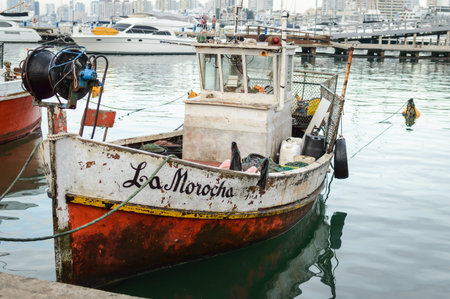 Fishing boats moored in the port of Valencia, Spain.