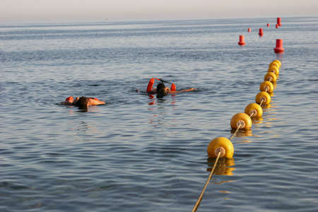 lifeguard practice rescue at seaの写真素材