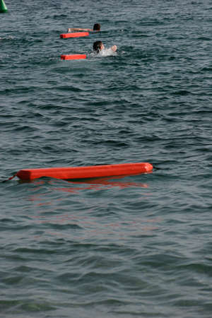 lifeguard practice rescue at seaの写真素材