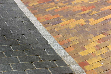 Details of the ground granite cobblestones in the streetの写真素材