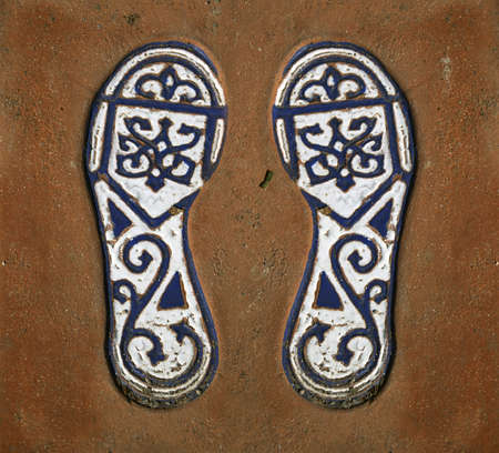 Design of footprints on pottery clayの写真素材