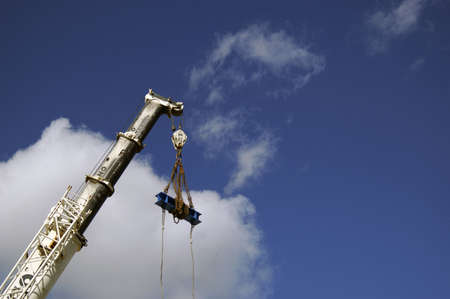 Huge cranes in a city with a seaportの写真素材