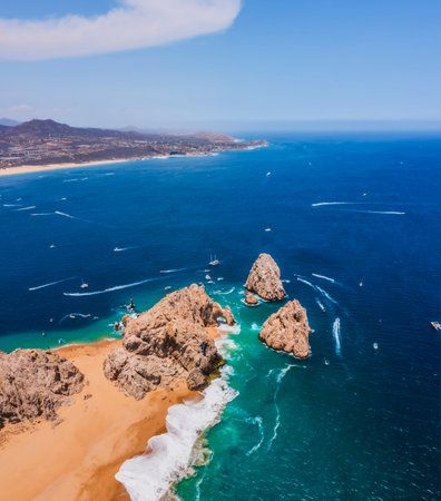 The Arch of Cabo San Lucas is an iconic rock formation in Baja California Sur, Mexico, where the Pacific Ocean and the Sea of Cortez meet.の写真素材