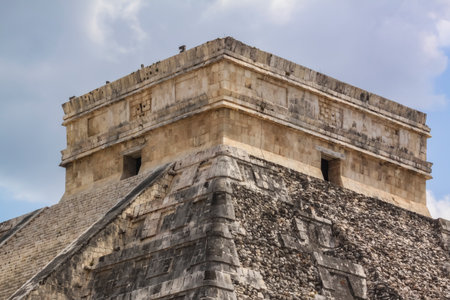 The Temple of Kukulcan, also known as El Castillo, is the imposing step pyramid at Chichen Itza, Yucatan, Mexico. With 365 steps symbolizing the days of the year.の写真素材