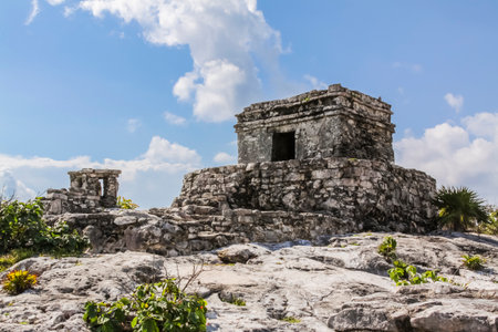 Temple of the Wind God, Tulum Archaeological Site, Quintana Roo, Mexico. Tulum, Is an ancient walled Mayan city, built facing the Caribbean Sea. Famous for its temple, El Castillo.の写真素材