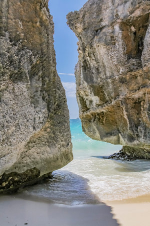 Broken rocks at Playa Ruinas in the Tulum Archaeological Zone, Quintana Roo, Mexicoの写真素材