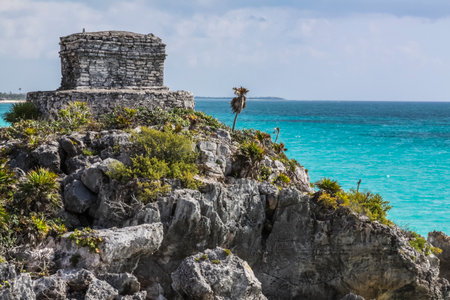 Temple of the Wind God, Tulum Archaeological Site, Quintana Roo, Mexico. Tulum, Is an ancient walled Mayan city, built facing the Caribbean Sea. Famous for its temple, El Castillo.の写真素材